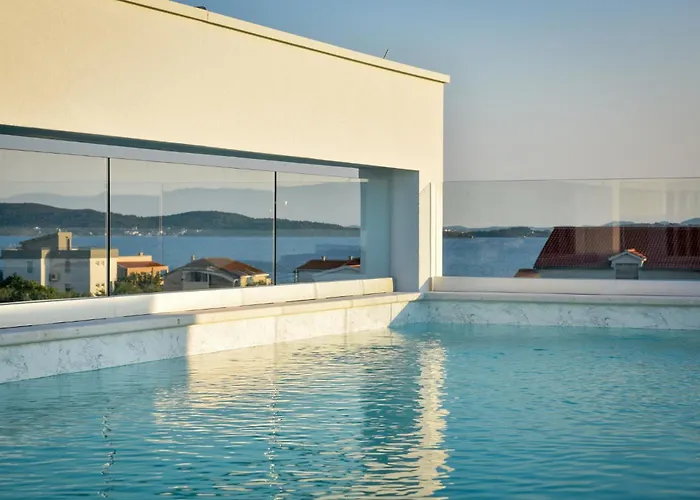 With Heated Rooftop Pool,