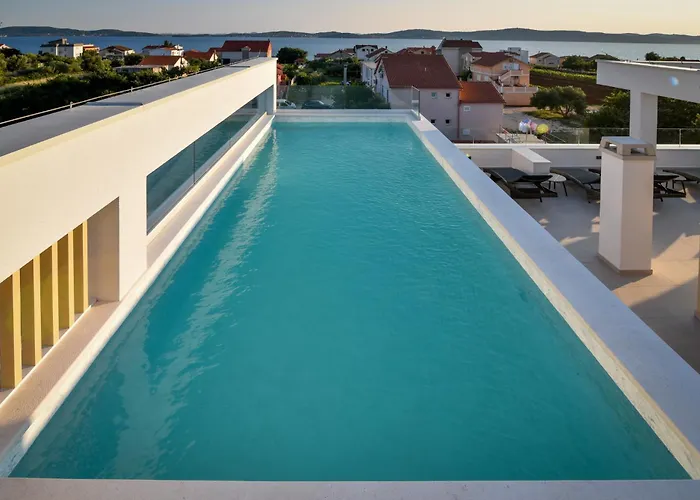 With Heated Rooftop Pool,