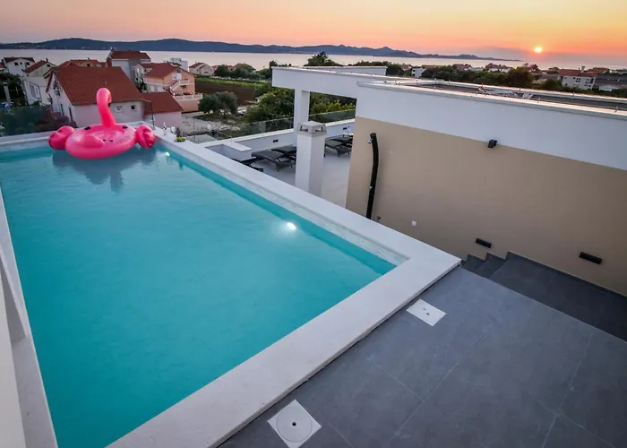With Heated Rooftop Pool,