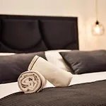 With Heated Rooftop Pool,