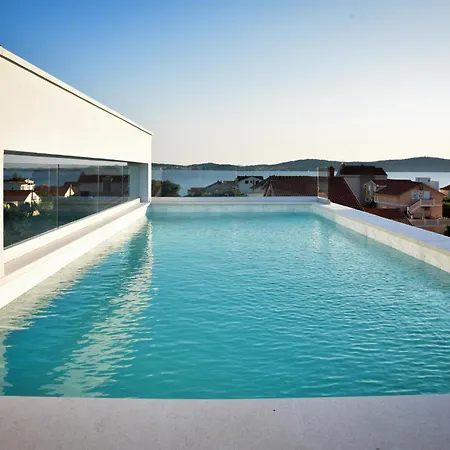 With Heated Rooftop Pool,