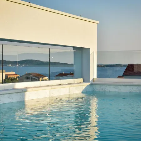 With Heated Rooftop Pool,