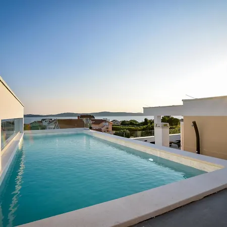 With Heated Rooftop Pool, Апартаменты