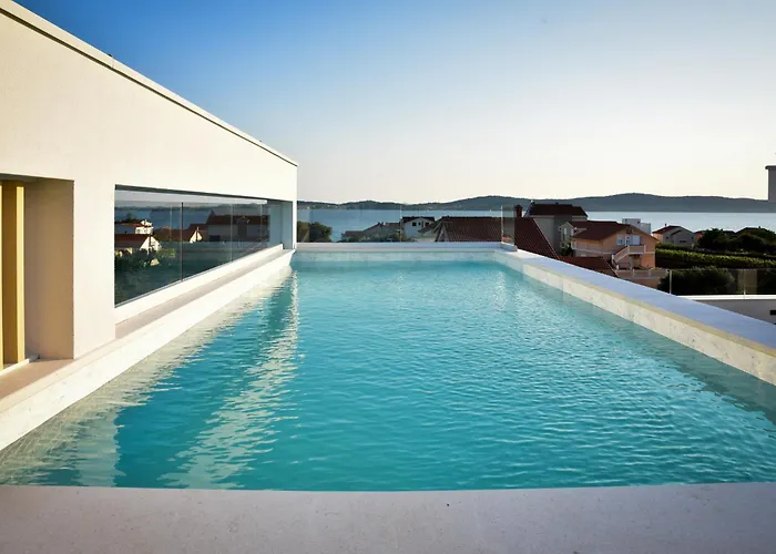 With Heated Rooftop Pool,